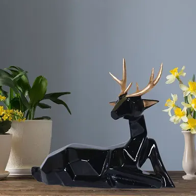 Black Polyresin Sitting Deer Figurine 6.5 in| Decorative Accent| Living Room Décor thumbnail 0