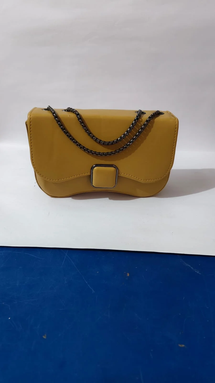 Elegant Mustard Yellow Structured Faux-Leather Crossbody Handbag featuring a Gunmetal Box-Chain Shoulder Strap, Contoured Flap Top, and Minimalist Square Snap Clasp Hardware image 1