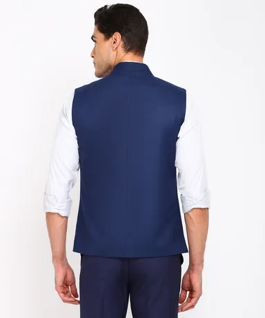 Men’s Nehru Jacket Kurta Set featuring a classic white kurta paired with a stylish sleeveless Modi Jacket Sadri/Koti in elegant navy blue, dark blue, and saffron shades, perfect for weddings and festive occasions. thumbnail 2