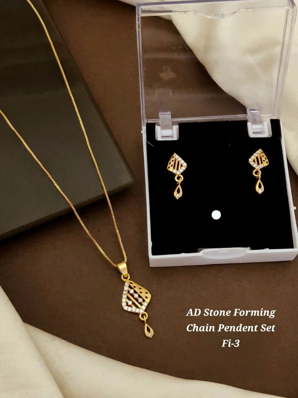 AD Stone Forming Gold Plated Pendant Chain Necklace Set for Women Designer Triangle Pendant Jewellery Set with Matching Earrings Party Wear Fashion Jewellery India image 4
