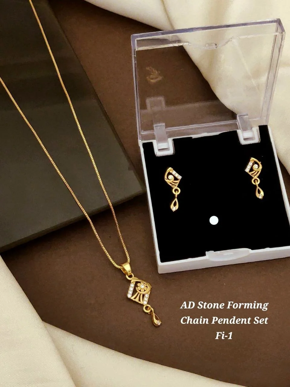 AD Stone Forming Gold Plated Pendant Chain Necklace Set for Women Designer Triangle Pendant Jewellery Set with Matching Earrings Party Wear Fashion Jewellery India image 5