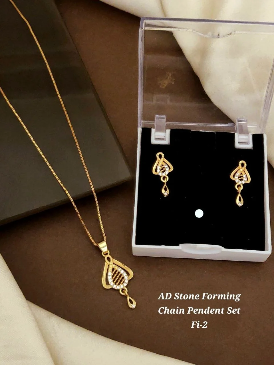 AD Stone Forming Gold Plated Pendant Chain Necklace Set for Women Designer Triangle Pendant Jewellery Set with Matching Earrings Party Wear Fashion Jewellery India image 6