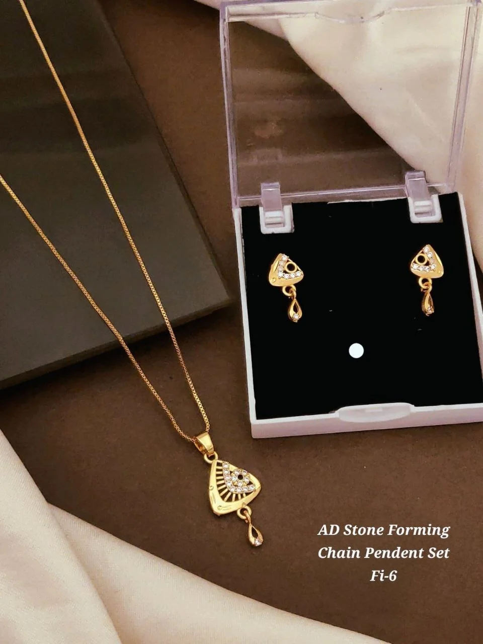 AD Stone Forming Gold Plated Pendant Chain Necklace Set for Women Designer Triangle Pendant Jewellery Set with Matching Earrings Party Wear Fashion Jewellery India image 1