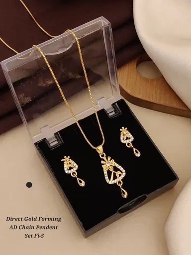Direct Gold Forming AD Stone Pendant Chain Necklace Set for Women Designer Triangle Crystal Pendant Jewellery Set with Matching Earrings Party Wear Fashion Jewellery India thumbnail 1