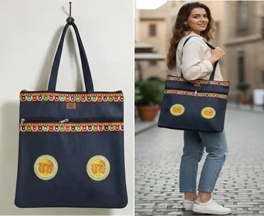 Handmade Blue Denim Tote Bag with Golden Radhe Radhe Embroidery Multicolored Ethnic Border Dual Zipper Boho Shoulder Bag for Women Festivals Shopping Everyday Use India Crafted by SEKU Creation Artisans thumbnail 0