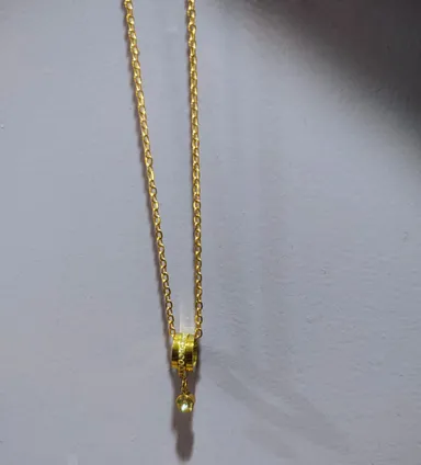 Elegant Gold Tone Pavé Set Cylinder Charm Necklace with Yellow Crystal Solitaire Pendant Stylish Fashion Jewellery for Women Party Wedding Wear thumbnail 1