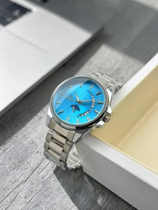 Omega Men’s Stainless Steel Sky Blue Analog Luxury Wrist Watch with Date Display Sapphire Style Dial Silver Strap Premium Formal Casual Watch for Men image 1