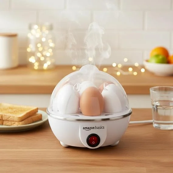 Amazon Basics 350W Electric Egg Boiler Cooker 7 Eggs Capacity Automatic 3 Mode Soft Medium Hard Boiling Stainless Steel Plate Overheat Protection Kitchen Appliance White Plastic Body image 2