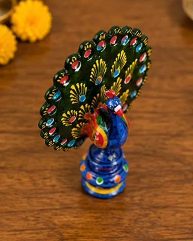 Hand-Painted Decorative Terracotta Peacock Figurine with Intricate Vibrant Fan-Shaped Plumage and Ornate Pedestal Base thumbnail 1