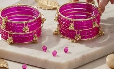 Traditional Gold-Plated Ruby Pink Crystal Beaded Bangles Set with Hanging Ghungroo Charms for Women, Kashmiri Style Festive Chooda Kada Jewellery Set, Ethnic Wedding Party Wear Designer Glass Bangles Ruby Pink, Gold Tone 2.8 thumbnail 0
